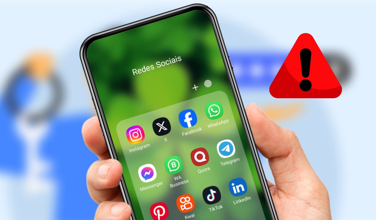 evitar golpes: aplicativos de redes sociais na tela do celular com um ícone de aviso